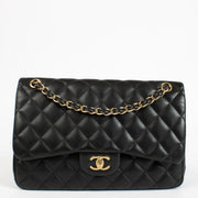 Authentic pre-loved Chanel Classic Large / Jumbo Black Lambskin Flap Bag on Labellov.com