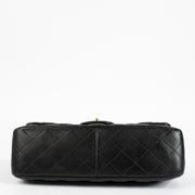 Authentic pre-loved Chanel Classic Large / Jumbo Black Lambskin Flap Bag on Labellov.com