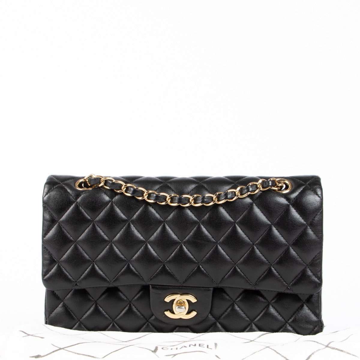 Shop safe online at Labellov in Antwerp, Brussels and Knokke this 100% authentic second hand Chanel Black Lambskin Medium Classic Flap 11.12 Bag