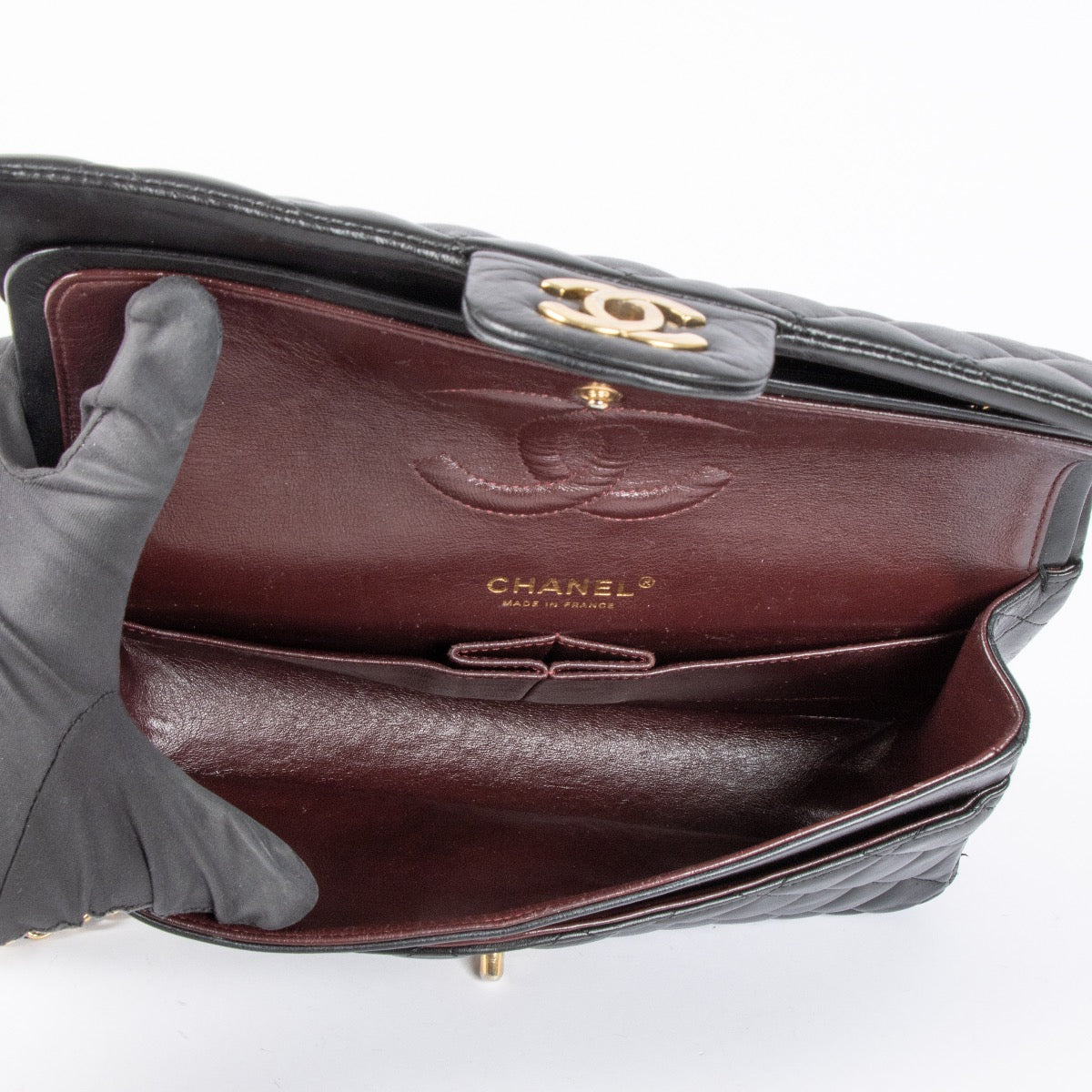Shop safe online at Labellov in Antwerp, Brussels and Knokke this 100% authentic second hand Chanel Black Lambskin Medium Classic Flap 11.12 Bag