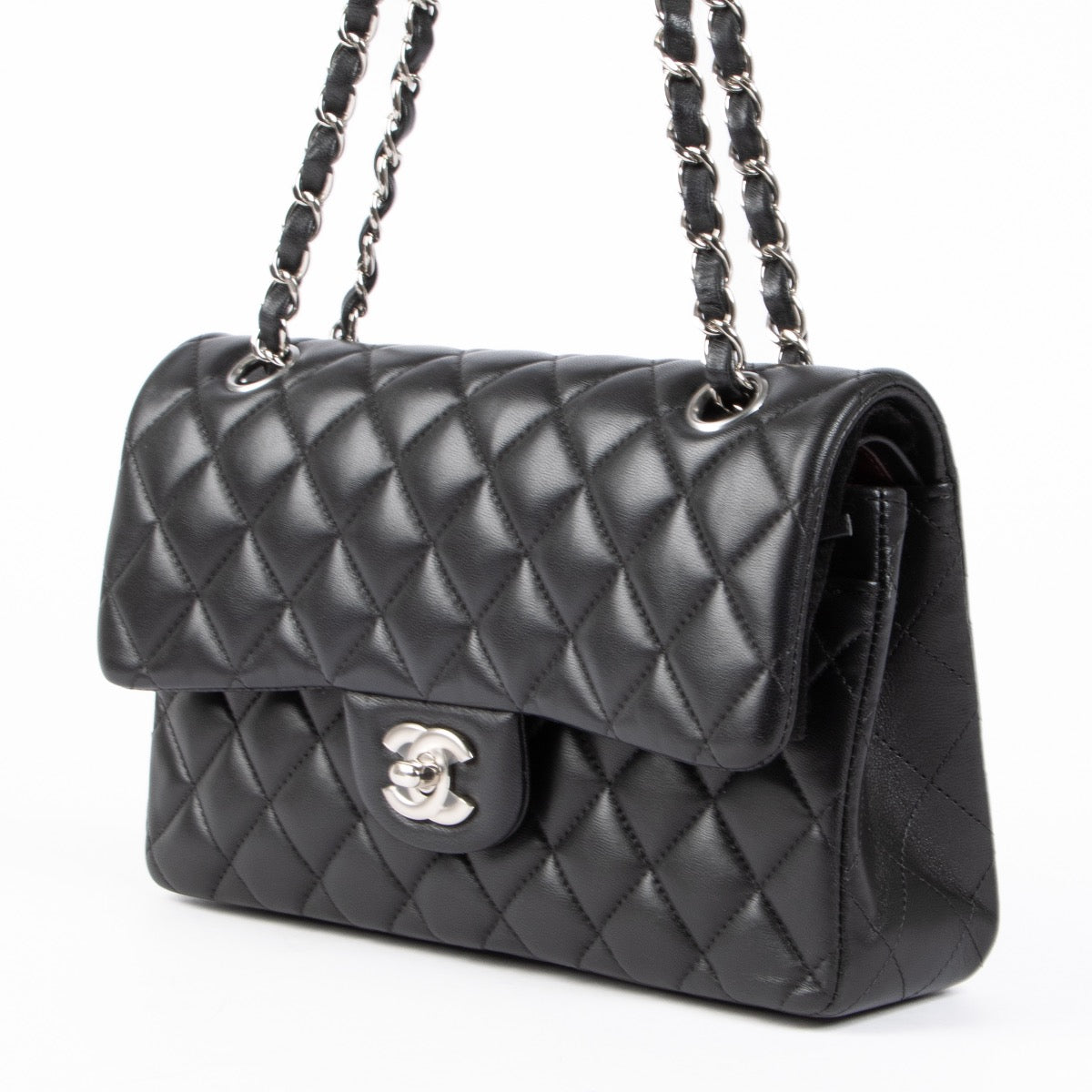 Shop safe online at Labellov in Antwerp, Brussels and Knokke this 100% authentic second hand Chanel Black Lambskin Small Classic Flap 11.12 Bag