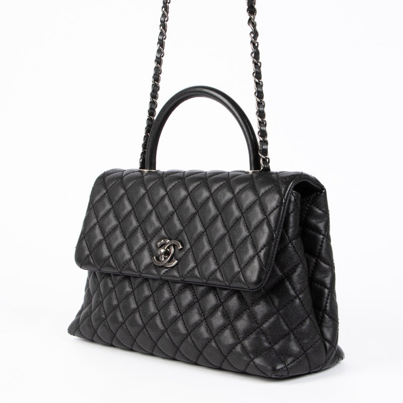 Authentic pre-loved Chanel Black Maxi Coco Handle Bag on Labellov.com