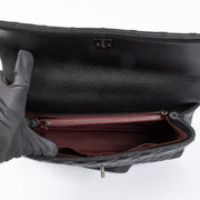 Authentic pre-loved Chanel Black Maxi Coco Handle Bag on Labellov.com