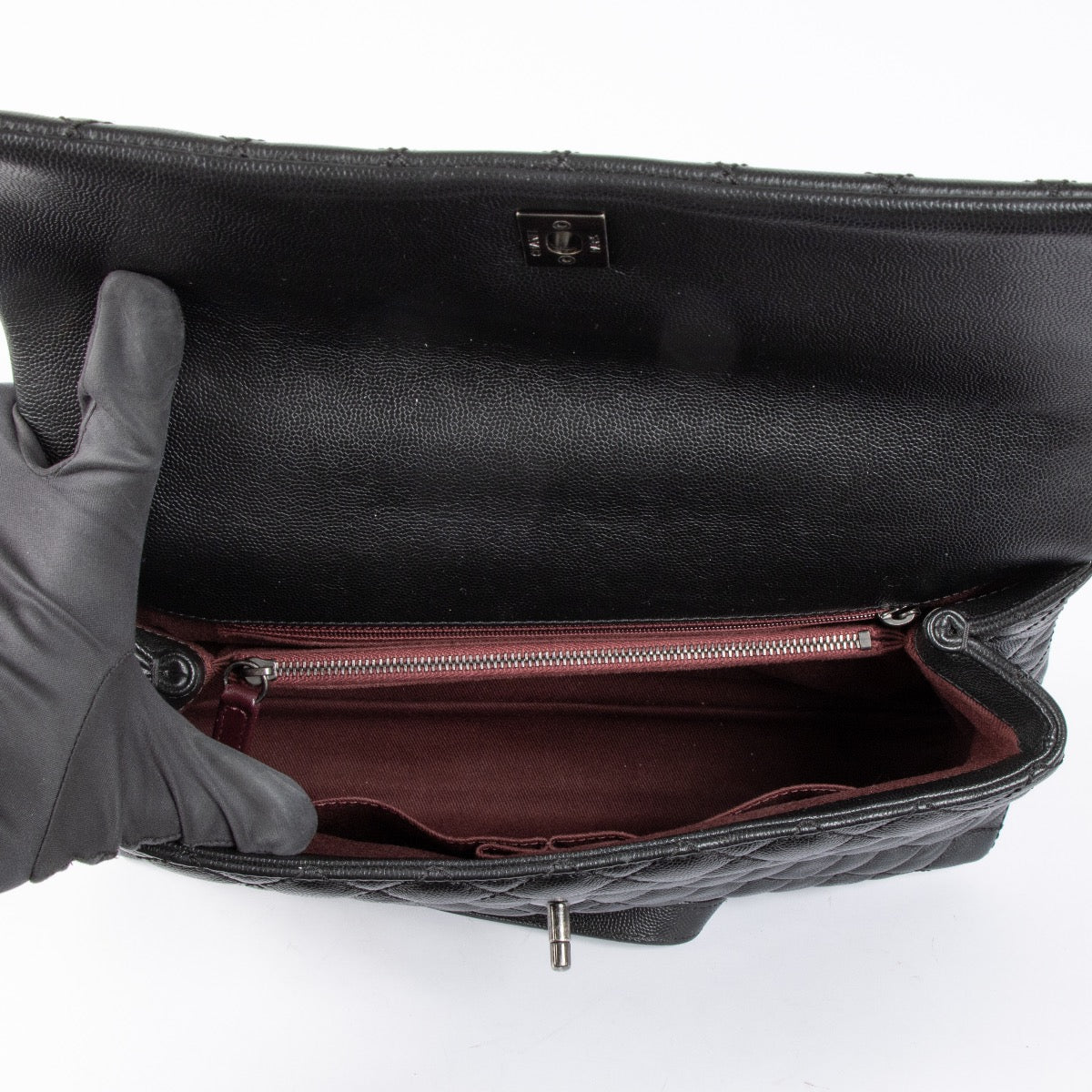 Authentic pre-loved Chanel Black Maxi Coco Handle Bag on Labellov.com