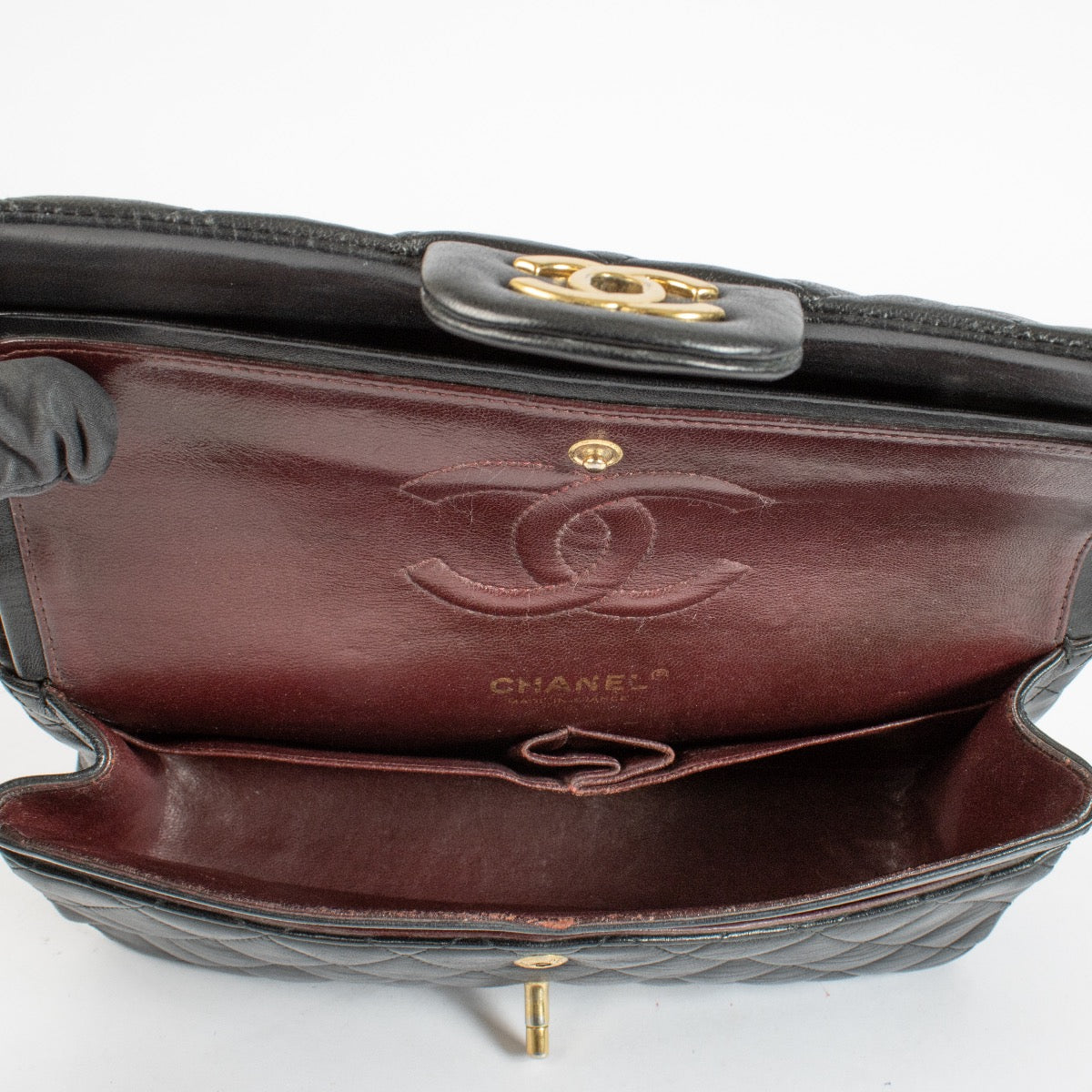authentic preloved Chanel Black Medium Classic 11.12 Flap Bag on Labellov.com