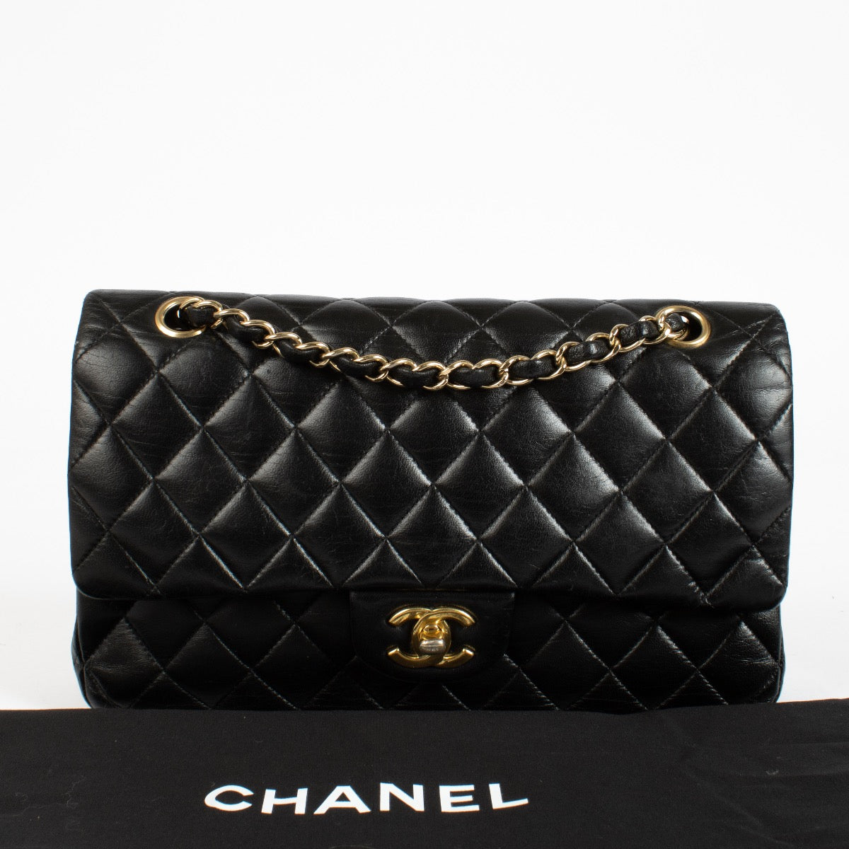 authentic preloved Chanel Black Medium Classic 11.12 Flap Bag on Labellov.com