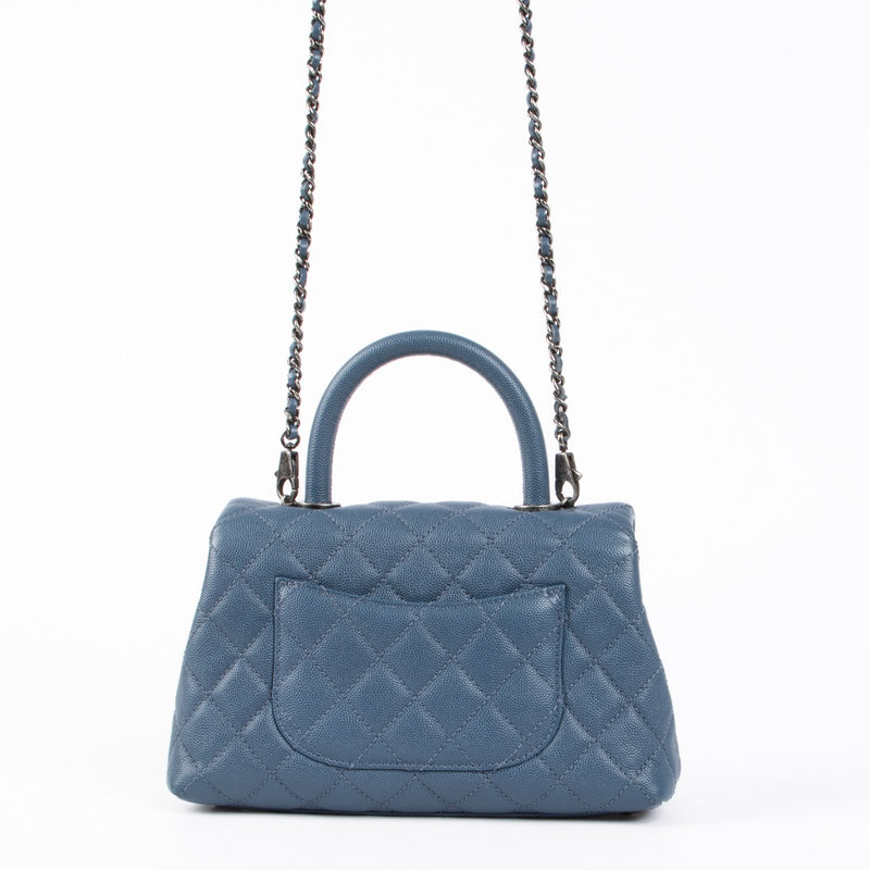 Authentic pre-loved Chanel Blue Small Coco Handle Bag on Labellov.com
