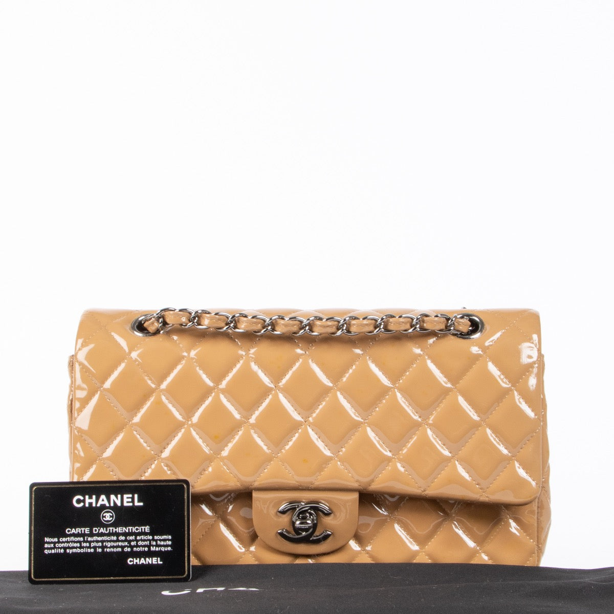 Shop safe online at Labellov in Antwerp, Brussels and Knokke this 100% authentic second hand Chanel Dark Beige Patent Leather Medium Classic 11.12 Handbag