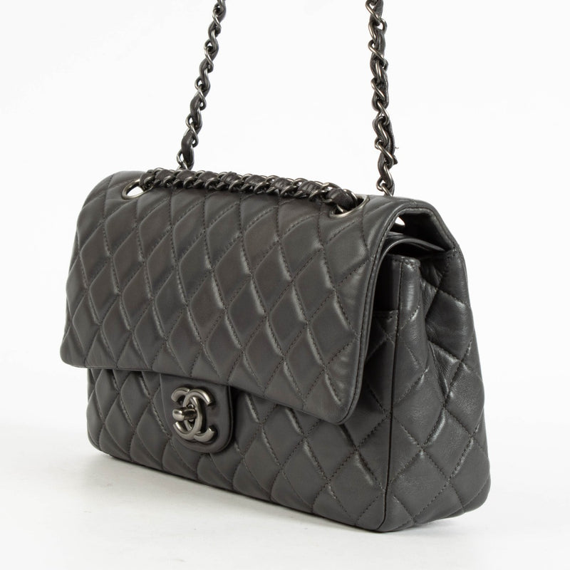 Shop the authentic Chanel Grey Lambskin Medium Classic Flap Bag second hand on Labellov.com.