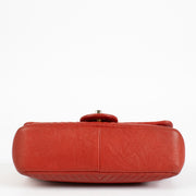 Authentic pre-loved Chanel Red Chevron Wrinkled Goatskin Medallion Mini Flap Bag on Labellov.com