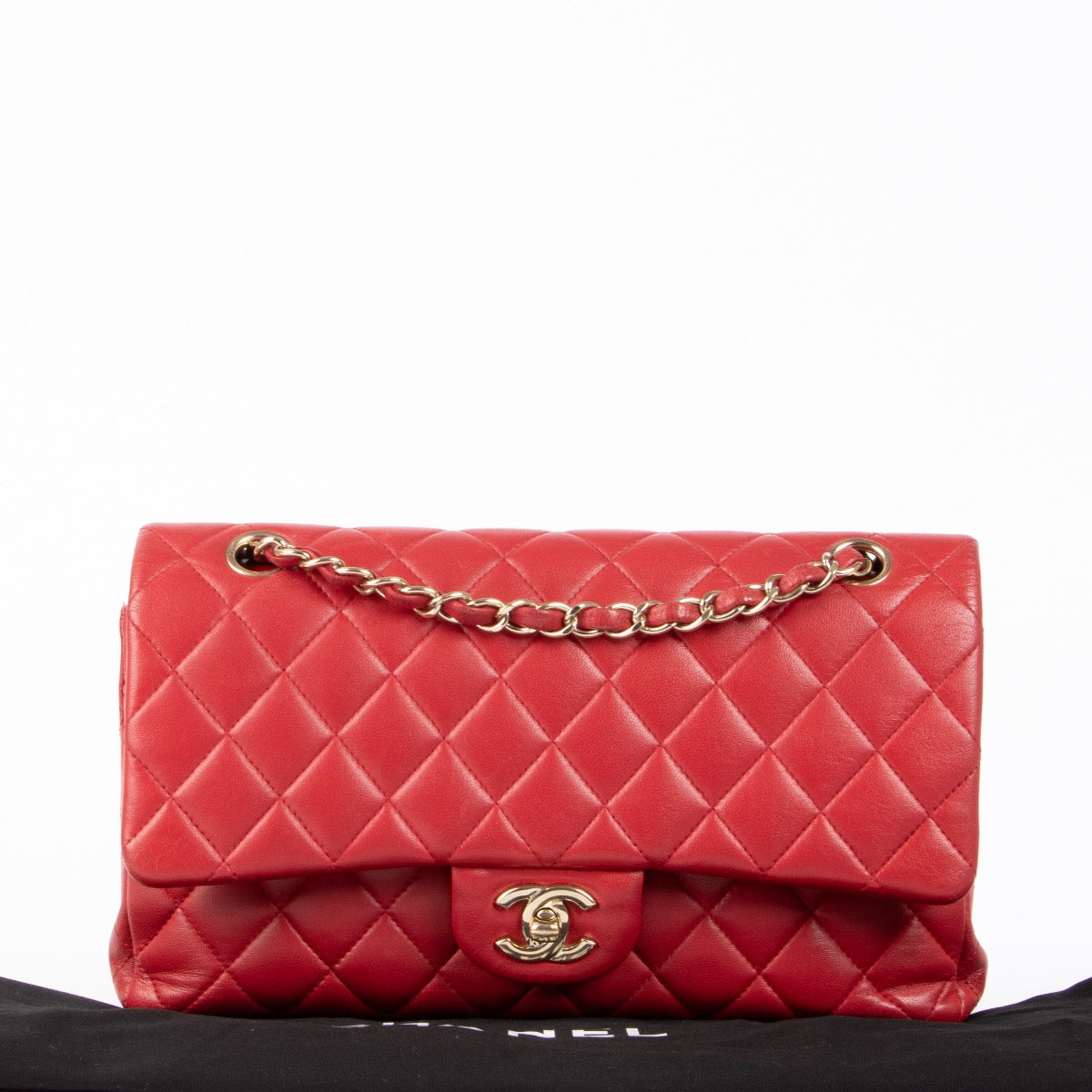 Authentic pre-loved Chanel Red Lambskin Medium 11.12 Classic Flap Bag on Labellov.com