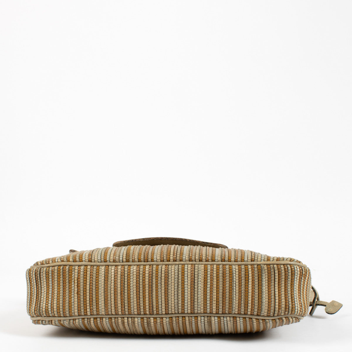 Delvaux vintage beige crossbody styled with neutral-toned outfit for timeless luxury look.
