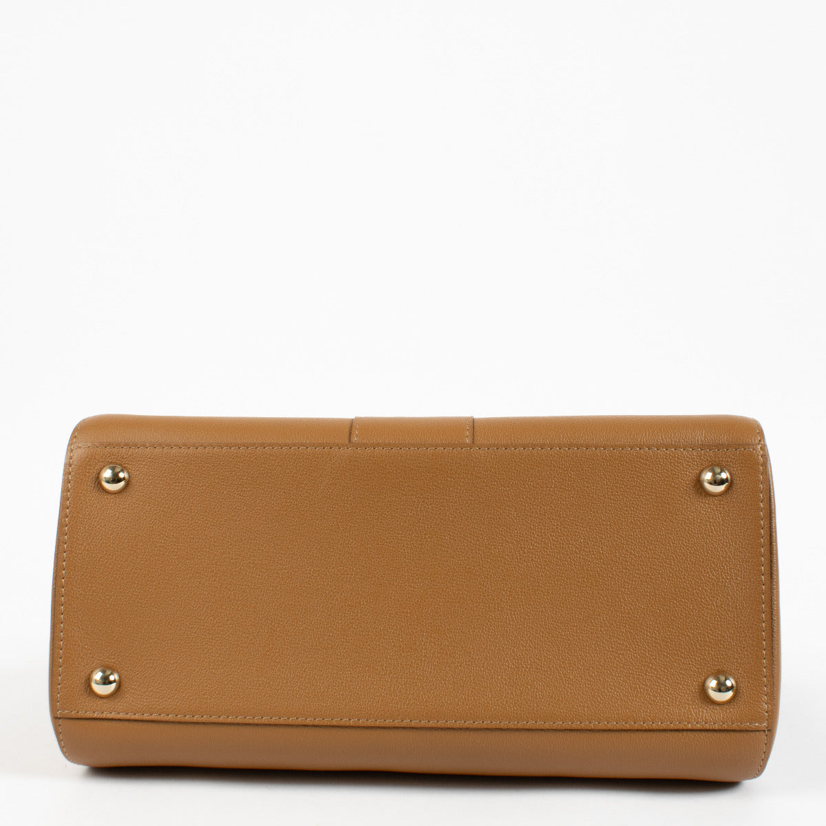 Delvaux Brillant MM in cognac styled for a polished everyday luxury look.