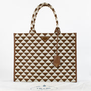 shop 100% authentic second hand Prada Tobacco/Chalk White Symbole Embroidered Fabric Tote Bag on Labellov.com