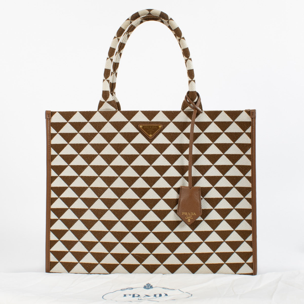 shop 100% authentic second hand Prada Tobacco/Chalk White Symbole Embroidered Fabric Tote Bag on Labellov.com