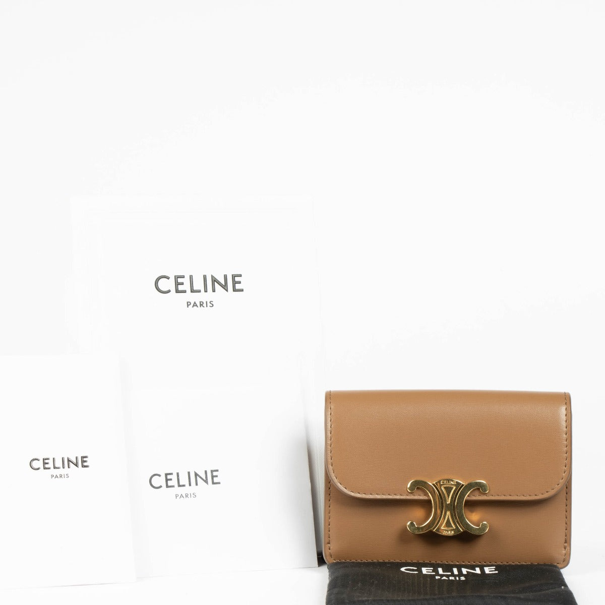 Shop this 100% authentic Celine Camel Smooth Leather Triomphe Card Holder With Flap at Labellov.com
