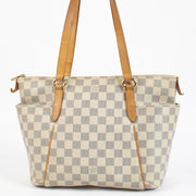Louis Vuitton Damier Azur Totally PM for the best price at Labellov secondhand luxury in Antwerp and Knokke. We buy and sell your preloved designer bags.