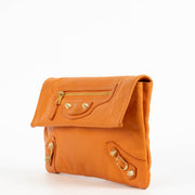 authentic preloved Balenciaga Orange Lambskin Motocross Giant Clutch on Labellov.com