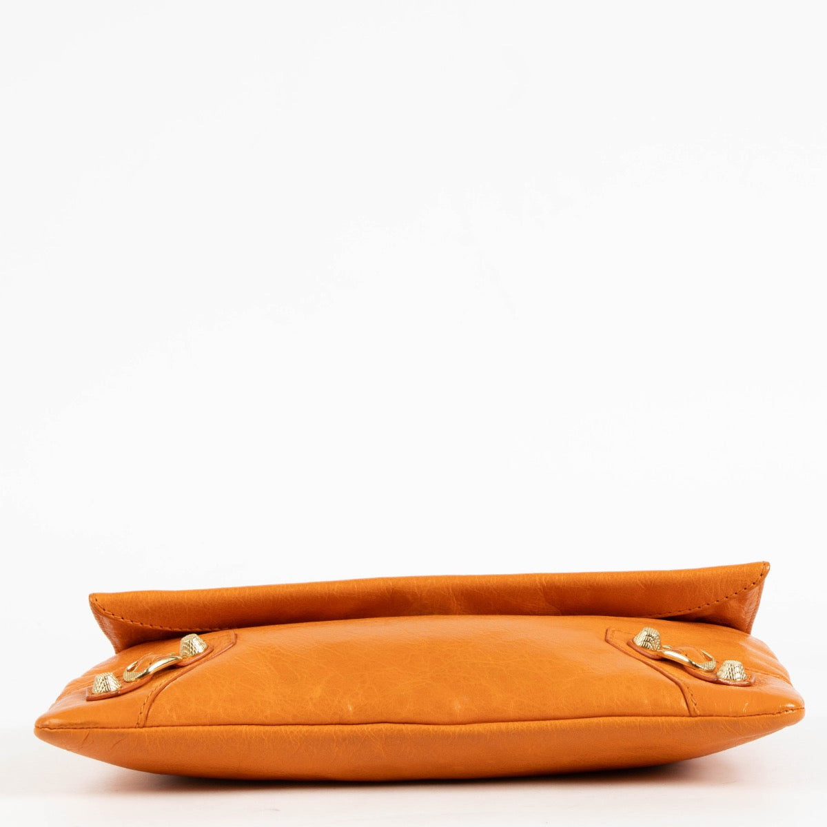 authentic preloved Balenciaga Orange Lambskin Motocross Giant Clutch on Labellov.com