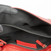 authentic preloved Balenciaga Red Lambskin Motorcross Classic Clutch on Labellov.com