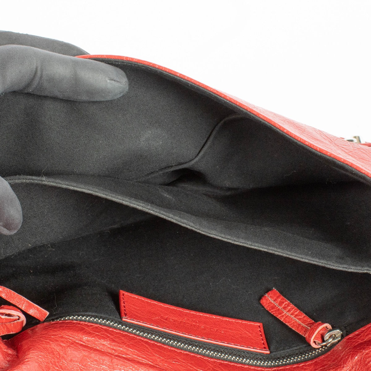 authentic preloved Balenciaga Red Lambskin Motorcross Classic Clutch on Labellov.com