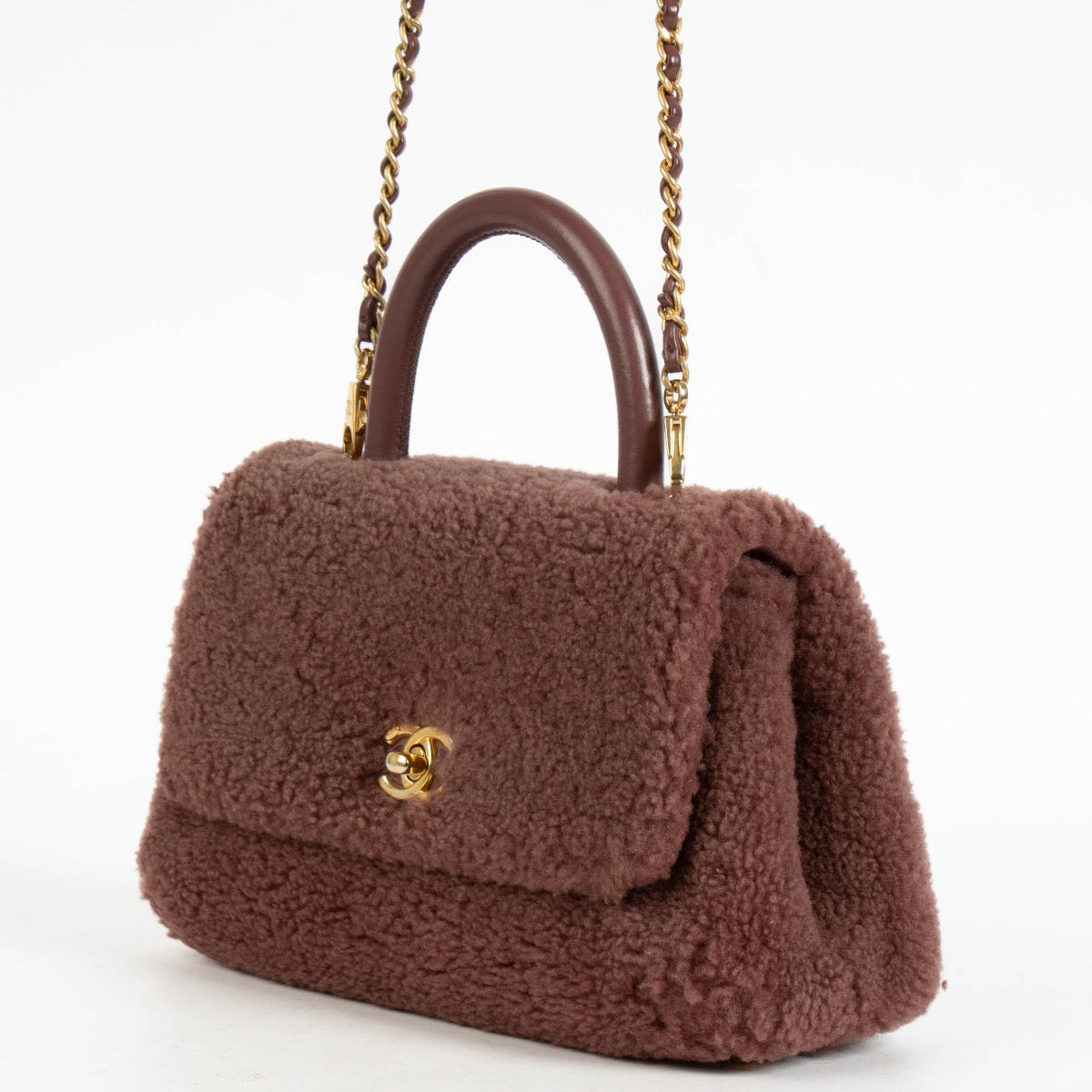 authentic preloved Chanel Burgundy Shearling Small Coco Handle on Labellov.com
