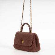 authentic preloved Chanel Burgundy Shearling Small Coco Handle on Labellov.com