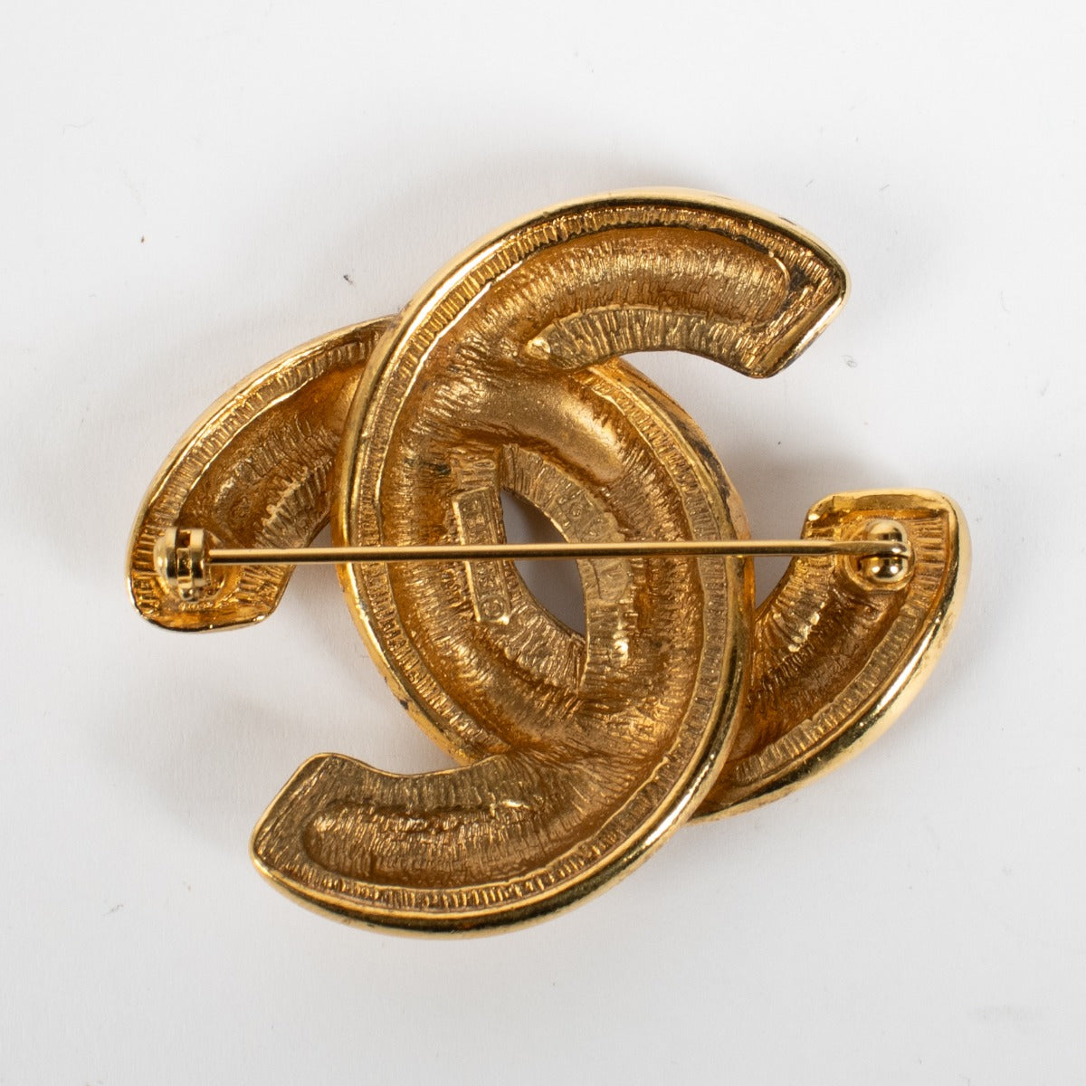Authentic preloved Chanel Gold CC Brooch on Labellov.com