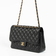 Shop safe online at Labellov in Antwerp, Brussels and Knokke this 100% authentic second hand Chanel Black Caviar Large/ Jumbo Classic Double Flap