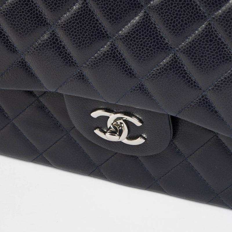 Shop safe online at Labellov in Antwerp, Brussels and Knokke this 100% authentic second hand Chanel Blue Caviar Large/ Jumbo Classic Double Flap