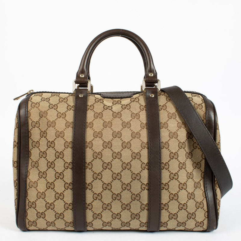 Gucci GG Supreme canvas Boston bag with brown leather trim at Labellov.com.