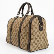 Gucci GG Supreme canvas Boston bag with brown leather trim at Labellov.com.