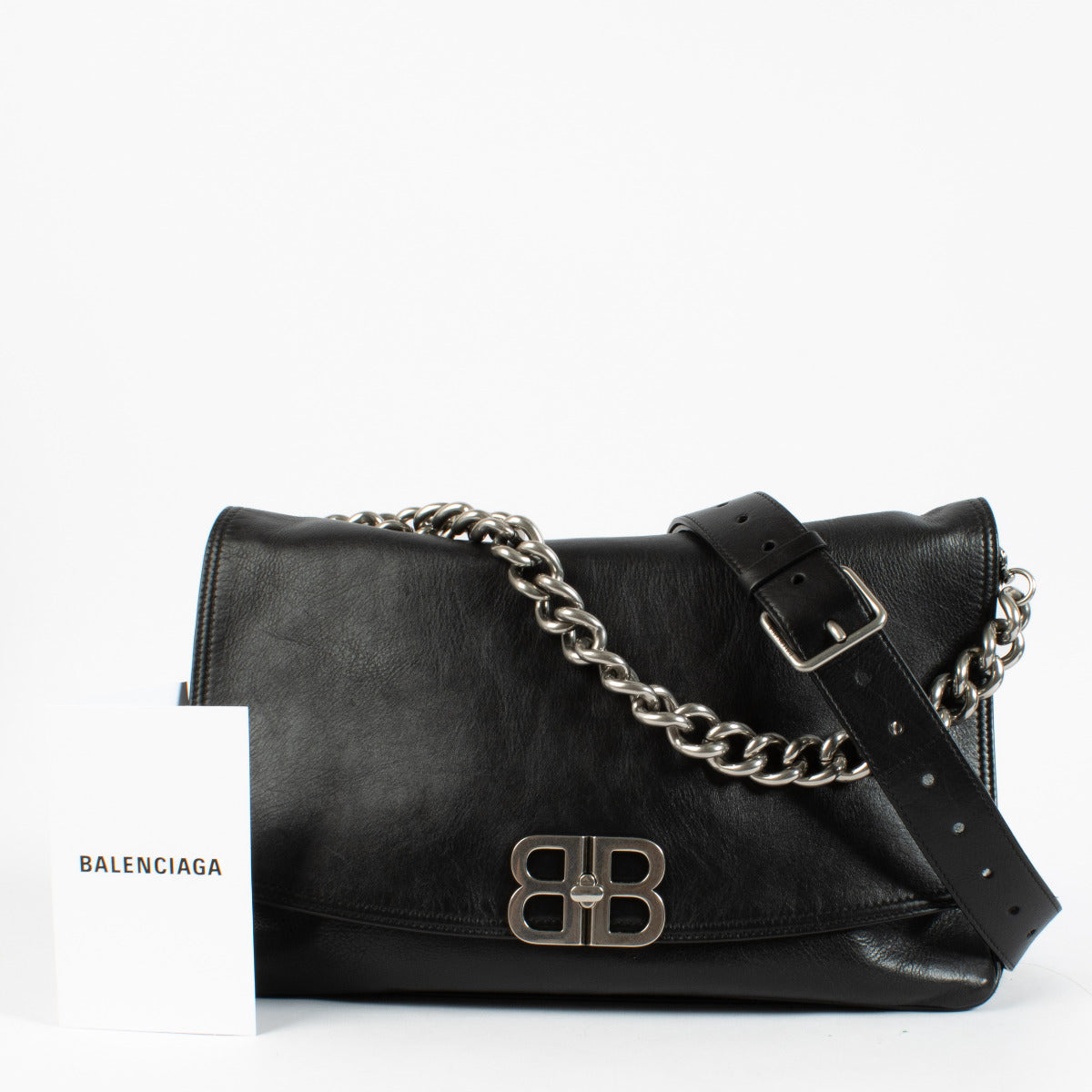 Balenciaga Black BB Soft Large Flap Bag Expertly crafted in supple black calfskin leather, the BB Soft Large Flap Bag radiates an urban-chic clarity. Its plush, almost pillowy silhouette is balanced by an aged-silver BB logo plaque that adds a signatur