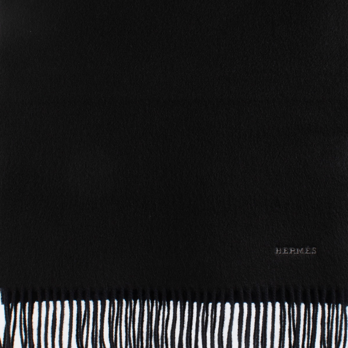 Are you looking for an authentic designer accessory? We buy and sell your preloved and brand new Hermès Recto-Verso Black/BLue Cashmere Scarf.