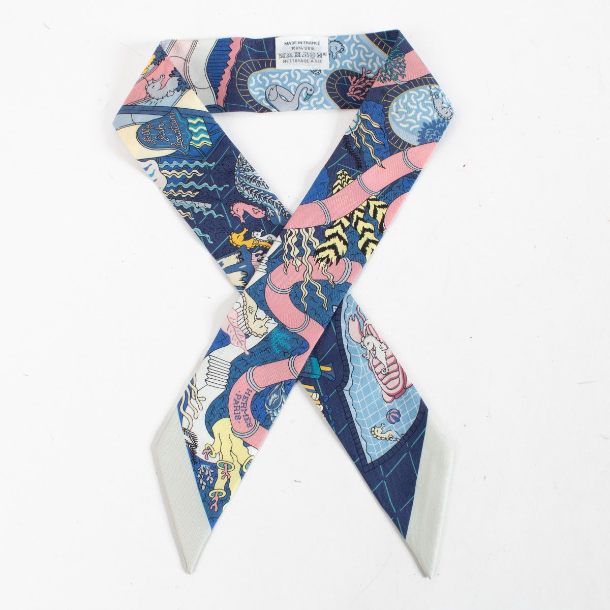 Are you looking for an authentic designer accessory? We buy and sell your preloved and brand new Hermès Blue Splash Park Twilly Scarf