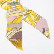 Are you looking for an authentic designer accessory? We buy and sell your preloved and brand new Hermès Yellow Astrologie Nouvelle Twilly Scarf.