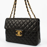 Buy 100% authentic second hand Chanel Black Lambskin Classic Flap Bag on Labellov.com