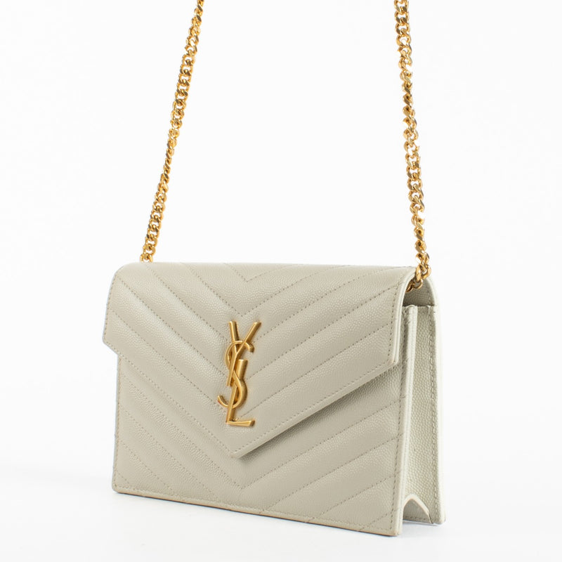 Authentic pre-loved Saint Laurent Cream Cassandre Envelope Chain Wallet on Labellov.com