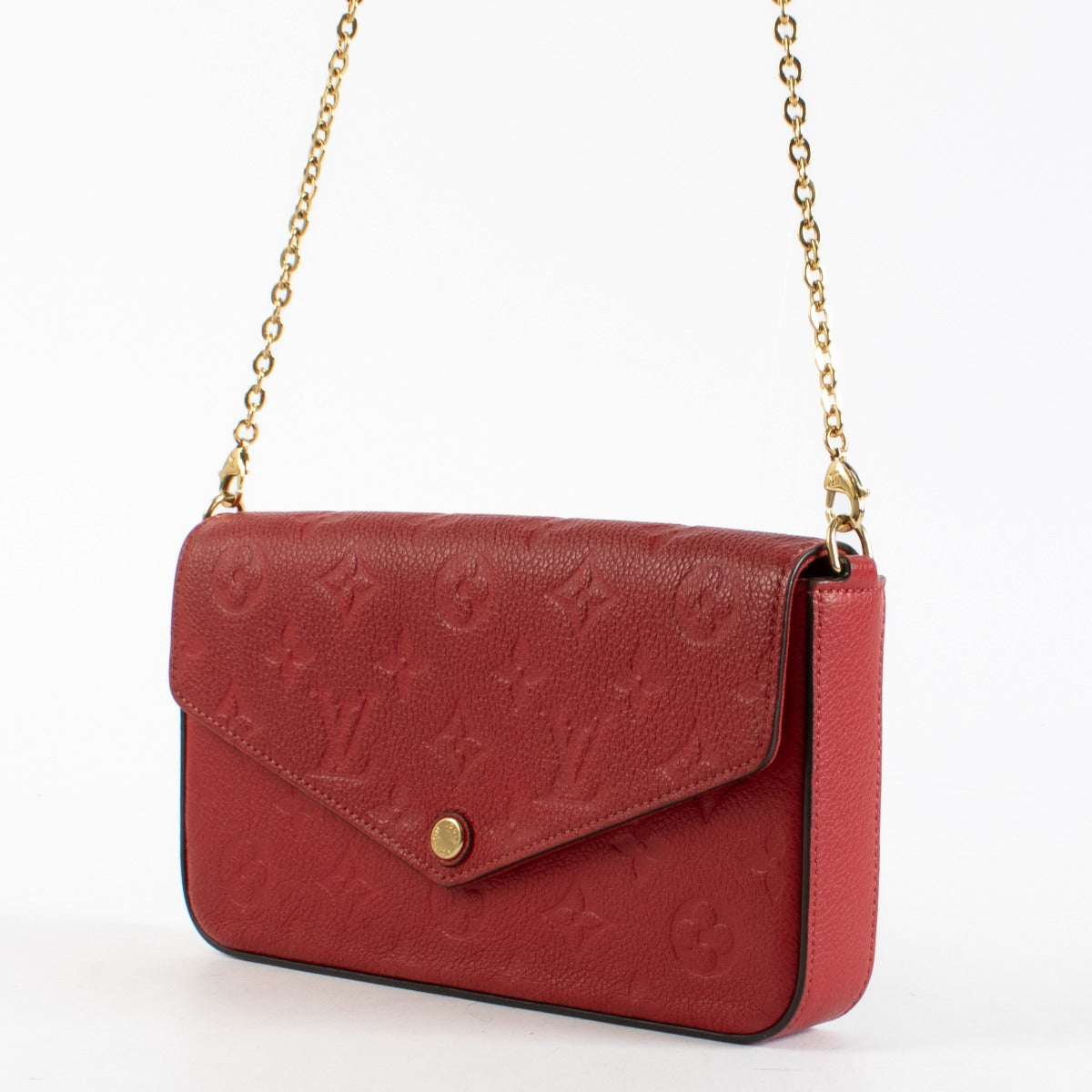 Red Louis Vuitton Monogram Empreinte Pochette Félicie wallet-on-chain with gold chain strap.