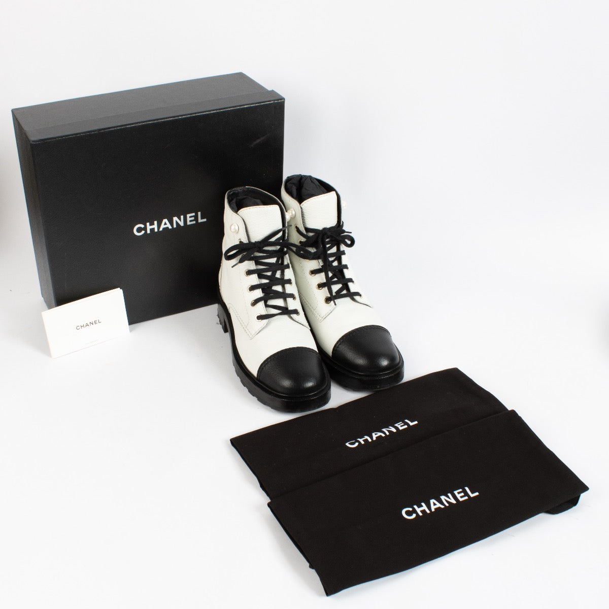 shop 100% authentic second hand Chanel Black And White Combat Boots - Size 40 1/2 on Labellov.com