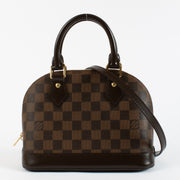 Louis Vuitton Damier Ebene Alma BB aan de beste prijs bij Labellov tweedehands luxe in Antwerpen en Knokke
