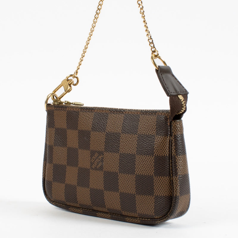 Shop 100% authentic second hand Louis Vuitton Damier Ebene Mini Pochette Accessoires on Labellov.com