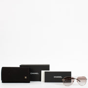 Authentic pre-loved Chanel Brown Aviator Sunglasses on Labellov.com