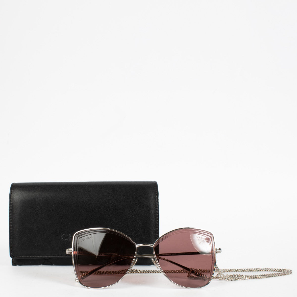 Authentic pre-loved Chanel Pink Sunglasses With Chain on Labellov.com