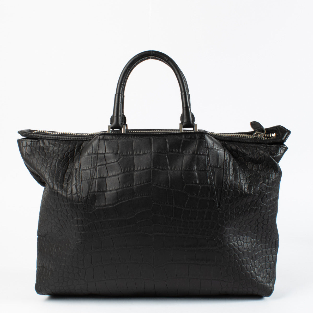 This bag is in very good pre-owned condition. The exterior is clean with light creasing and minimal wear. The structure remains firm, handles are strong, and hardware is bright with minor surface wear.