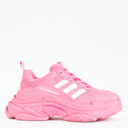 Bold, unapologetic, and rooted in fashion-forward design, the Balenciaga x Adidas Pink Triple S Sneakers are the epitome of luxury streetwear collaboration. Merging Balenciaga’s avant-garde aesthetic with Adidas’ iconic sportswear heritage, this striking