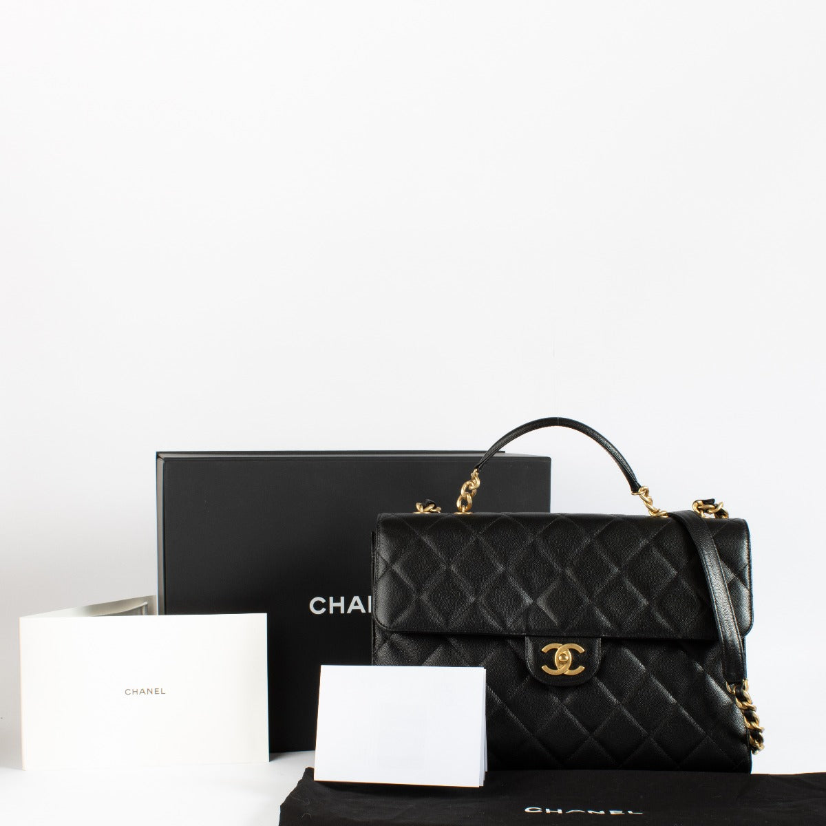 Sac mallette Chanel en caviar noir