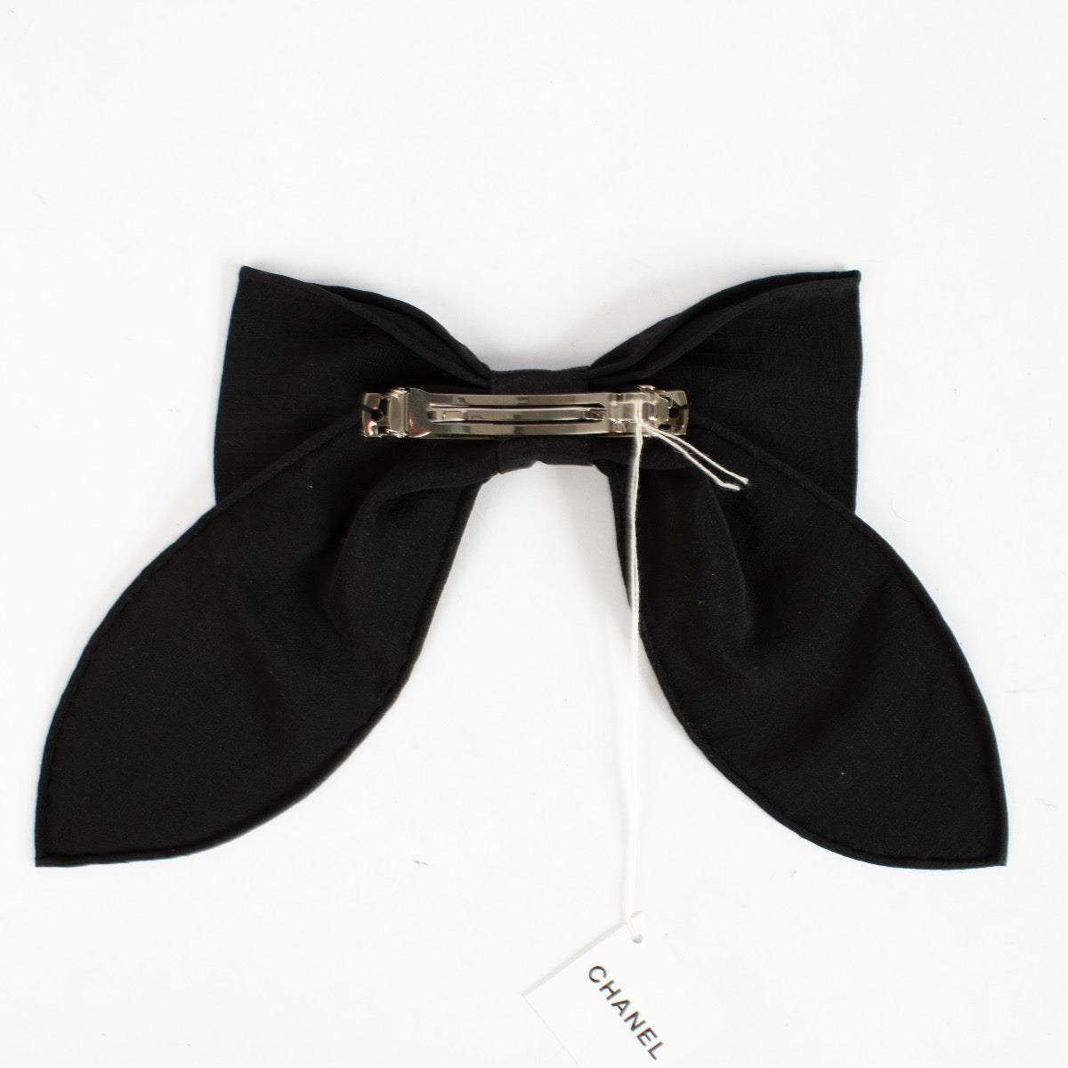 Barrette à nœud en soie noire Chanel