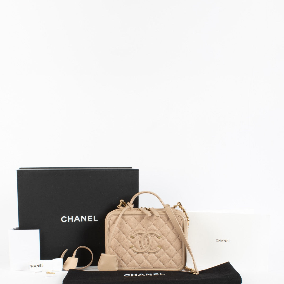 Authentic Second Hand Chanel Beige CC Filigree Vanity Case Bag on Labellov.com