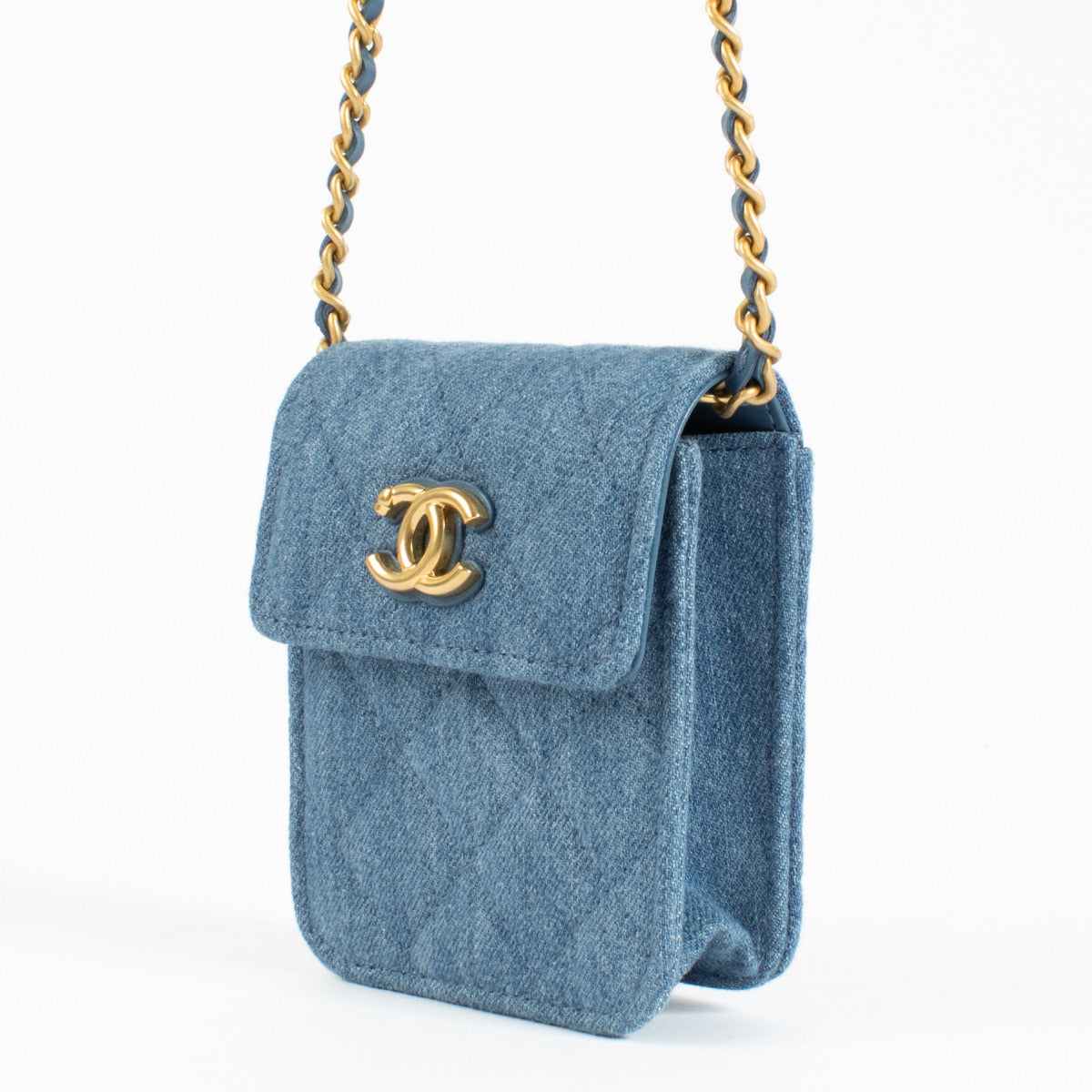 This item is in Excellent condition, showing no visible signs of wear. The denim exterior remains pristine, the gold-tone hardware gleams beautifully, and the interior is immaculate.